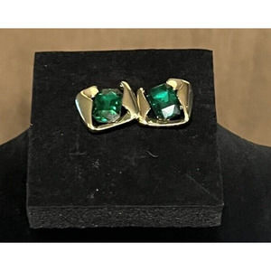 womans stud earrings with stone